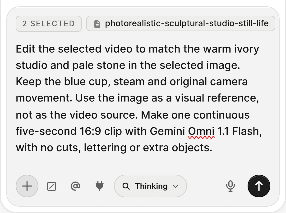 Actual Agent composer showing two selected canvas assets and a prompt that distinguishes the video source from the studio image reference.